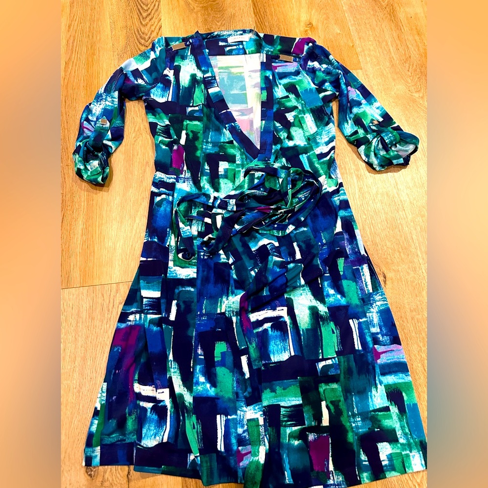Worn once Calvin Klein wrap dress size 4 with sliver embellishments